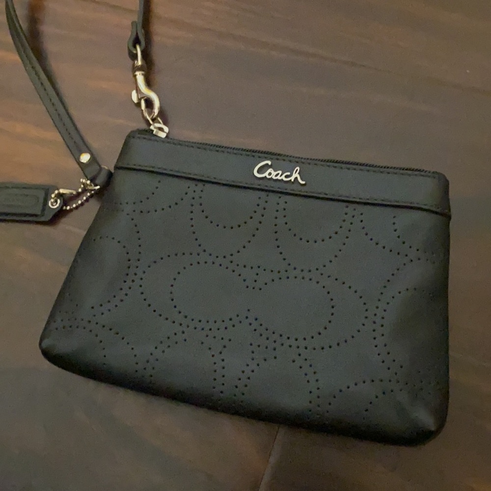 Like new Coach black wristlet with large C pattern
